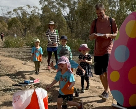 Parents and children on a KID-O orienteering course in a bush setting